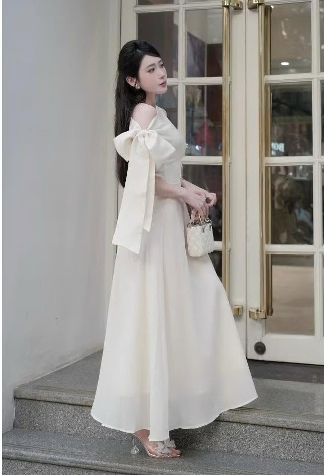 https://vayhoasim.vn/Đầm tơ xòe dài cột nơ chéo vai Size S -Mã  KESK038